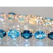 B002, London & Swiss Blue Topaz Gold bracelet